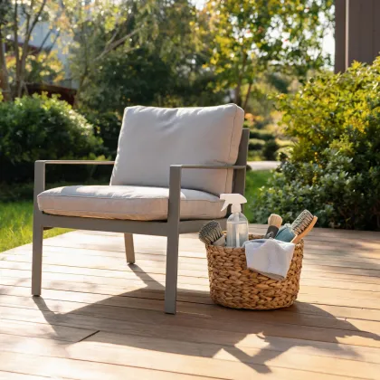 Outdoor patio chair with washable cushion and cleaning basket